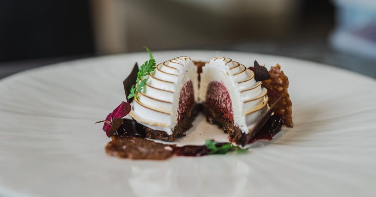 Baked Alaska with blackcurrant sorbet