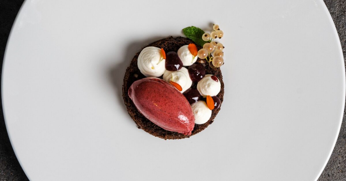 Danish rye layered cake with blackcurrant sorbet
